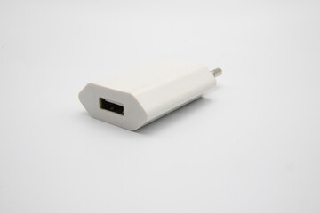 Close-up white charger on white isolated background.