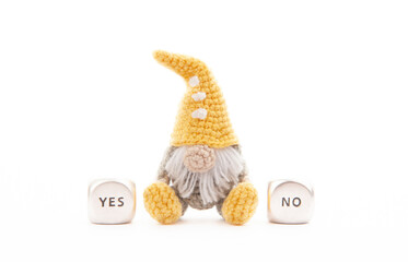 image of wool toy yes no cube white background