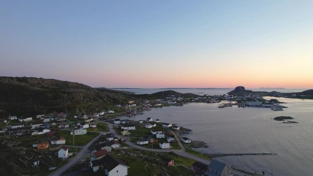 Sunset over a small coastal fishing town