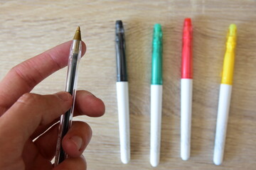 Pen of several colors for writing and drawing.