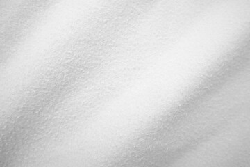 Felt white soft rough textile material background texture close up, felting and frieze poker...