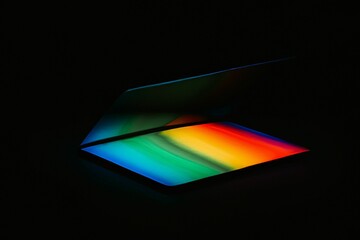 AI-generated digital art of a colorful tablet screen isolated on a black background