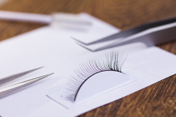 Eyelash extension set and training eyelash extension on the tester on the table