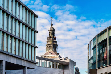 Maastricht, Netherlands. View from Mosae Forum to the tower of the town hall.