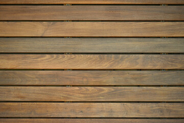 Fondo con detalle y textura de superficie de multitud de lamas de madera en tonos marrones