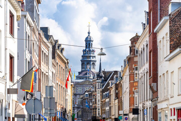 Maastricht, Netherlands. Beautiful facades with town hall in background - obrazy, fototapety, plakaty
