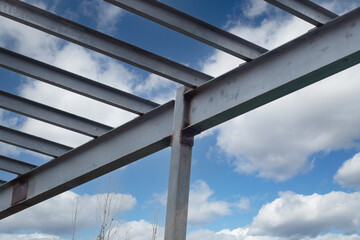 Fototapeta na wymiar Metal structures on the construction of a house.Fastening of metal structures to the foundation.
