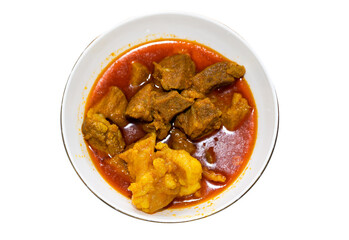 Beef or curry homemade recipe  in a bowl with white background
