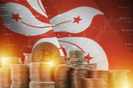 Hong kong flag and big amount of golden bitcoin coins and trading platform chart. Crypto currency