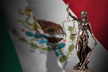 Mexico flag with statue of lady justice and judicial scales in dark room. Concept of judgement and...