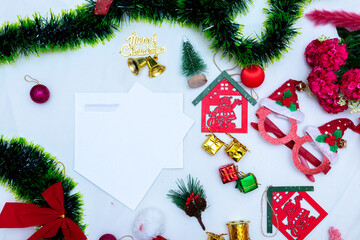 Fototapeta na wymiar A Blank Greeting Card With Christmas Season Themed Decorations