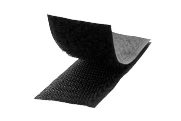 Velcro fastener for clothes isolated on white background, top view. Black velcro, top view. Contact...