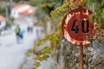 Rusty 'Tempo 40' Road Sign in Portugal