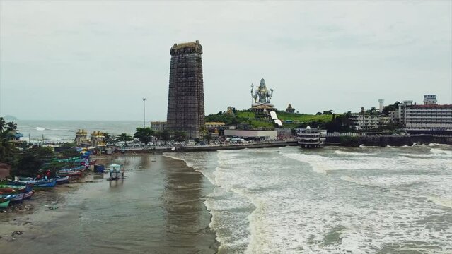 Aerial Footage Of Murudeshwar Temple and Statue of Shiva with waves 