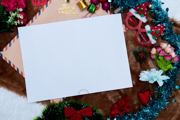 Mockup Image of a Blank White Greeting Card With Christmas Themed Decorations