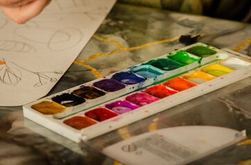 Paints and brushes for painting. Children's creativity, art