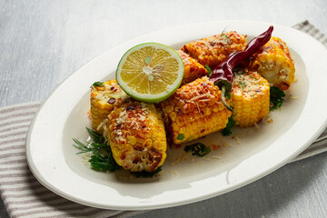 grilled corn with spices, top view, no people, homemade,