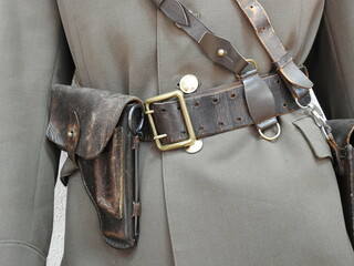 leather belt with holster on the soviet soldier uniform
