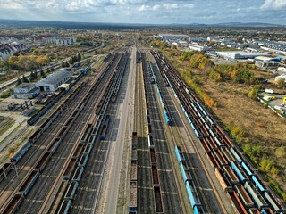 Fototapeta premium empty wagons are waiting at the train station for coal to be taken to the power plant