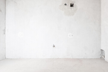 interior of the apartment without decoration in gray colors