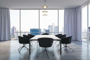 Front view on wooden surface conference table surrounded by black chairs on concrete floor in sunlit spacious meeting room with city skyline view from panoramic windows. 3D rendering