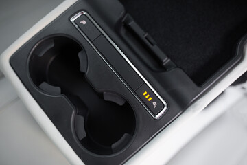 Modern car cup holder with heating and cooling mode