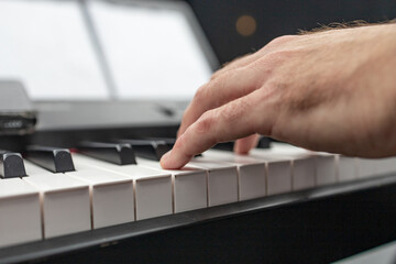 person playing piano, person playing piano