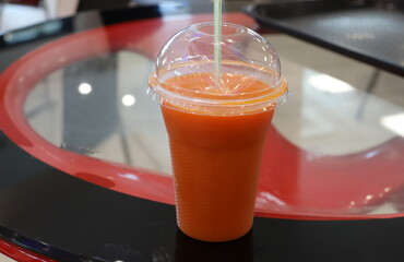 A non-alcoholic soft drink is poured into a glass.