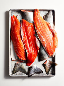 Wild raw salmon on a tray