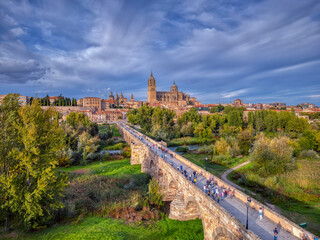 Aerial view of Salamanca with the cathedral and the roman bridge. - obrazy, fototapety, plakaty
