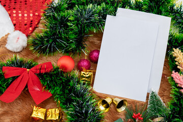 Christmas Greeting Card of a Blank Paper With Christmas Decorations