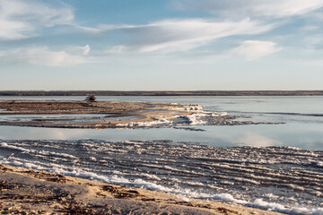 seashore in winter with ice