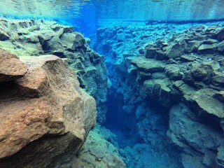 Beautiful underwater shot of rocks, Silfra snorkeling at Thingvellir National Park in Iceland