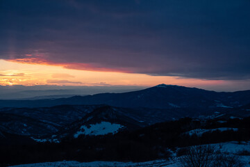 Fototapeta na wymiar sunset in the snowy mountains