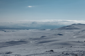 Caucasian mountains covered with snow on a sunny day