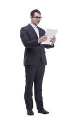 side view of a business man with the mobile phone and briefcase
