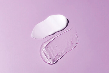 Soothe cream lotion moisturiser gel smear on purple background. Skincare and body beauty product....