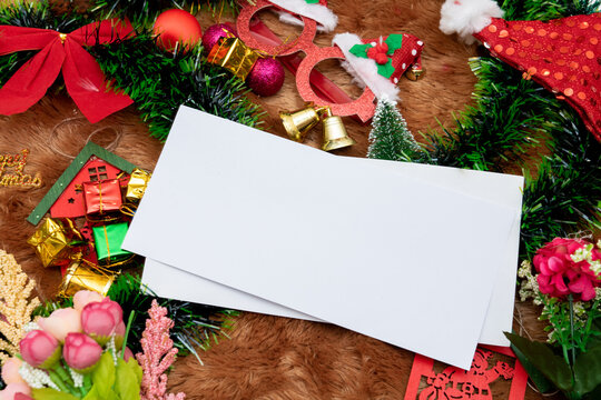 A Blank Greeting Card With Christmas Season Themed Decorations