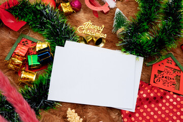 Fototapeta na wymiar Rectangle Christmas Greeting Cards Mockup Image With a Lot of Christmas Decorations