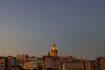 Obraz premium Galata Tower view in the evening from Golden Horn. Landmarks of Istanbul