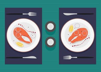 Delicious Dinner or Lunch for two. Red fish with onion, lemon and sauce on the table