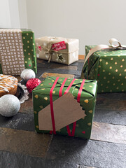 Handmade christmas presents wrapped with love: ornaments, cake, and gifts.