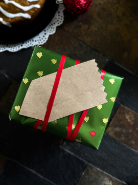 Handmade christmas presents wrapped with love: ornaments, cake, and gifts.