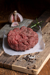 raw minced meat on dark wood