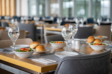 Bread and Salad on the Table in a Luxury Restaurant