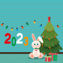 The symbol of the new year 2023 is a rabbit on a blue background with a Christmas tree