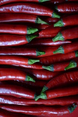 background of red hot peppers close-up, natural red background without processing texture of vegetables, eco cooking