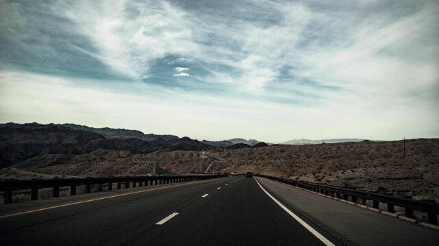 Beautiful shot of an empty road in the middle of Nevada landscapes