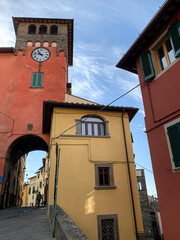 Loro Ciuffenna, Tuscany, Italy. Loro Ciuffenna village street view. Torre dell'orologio at via Dante Alighieri. Loro Ciuffenna is a comune in the Province of Arezzo in the Italian region 