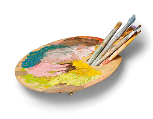 Artist palette, colors and brushes isolated on white